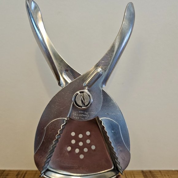 Metal art's Stainless Steel Squeezer - Picture 1 of 5